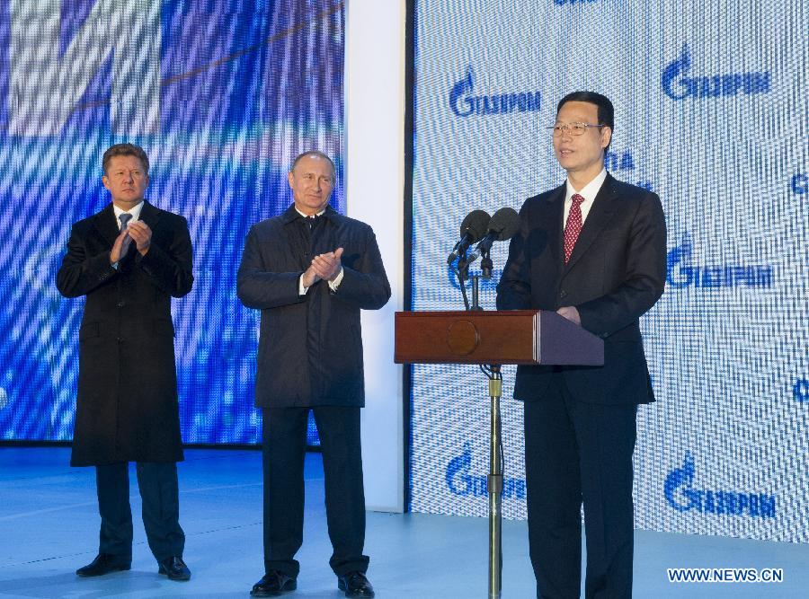 Чжан Гаоли и В.Путин приняли участие в церемонии начала строительства восточного участка китайско-российского газопровода
