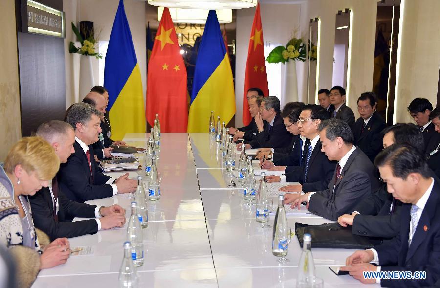 Ли Кэцян встретился с президентом Украины П. Порошенко