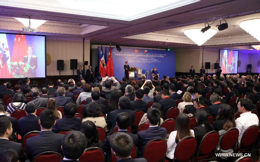 Ли Кэцян и М.Бачелет приняли участие в открытии торгово- экономического семинара и 7-го заседания Комиссии предпринимателей Китая и Чили