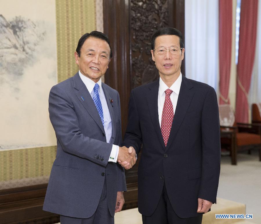 Чжан Гаоли встретился с вице-премьером, министром финансов Японии Таро Асо