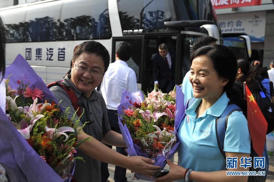 Триумфальное возвращение домой делегации по заявке Пекина на проведение зимней Олимпиады-2022