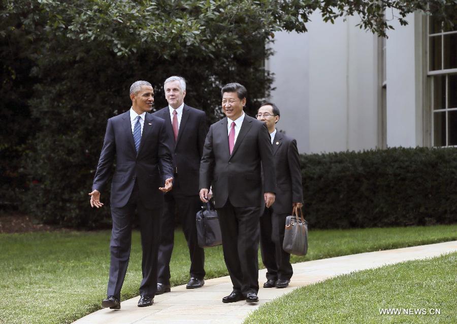 Вашингтон, 26 сентября /Синьхуа/ -- В пятницу председатель КНР Си Цзиньпин и президент США Барак Обама провели встречу, по окончании которой они совместно встретились с журналистами. 