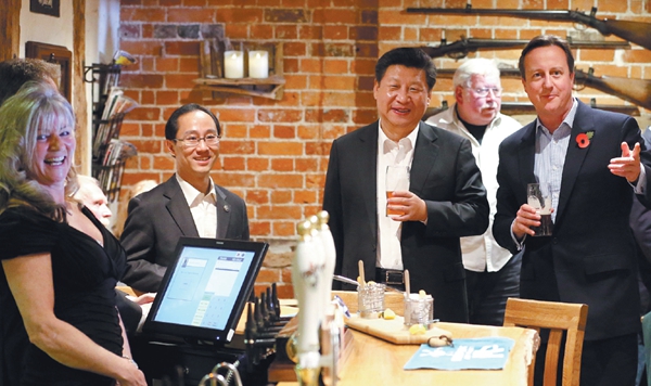 Си Цзиньпин и Дэвид Кэмерон выпили в баре после встречи