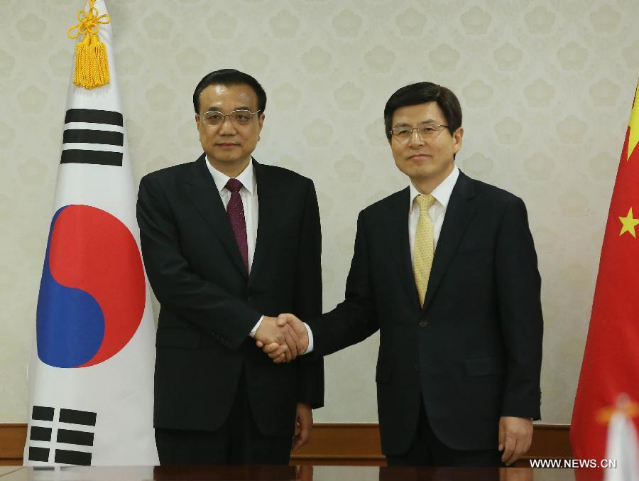 Ли Кэцян встретился с премьер-министром Республики Корея Хван Гё Аном