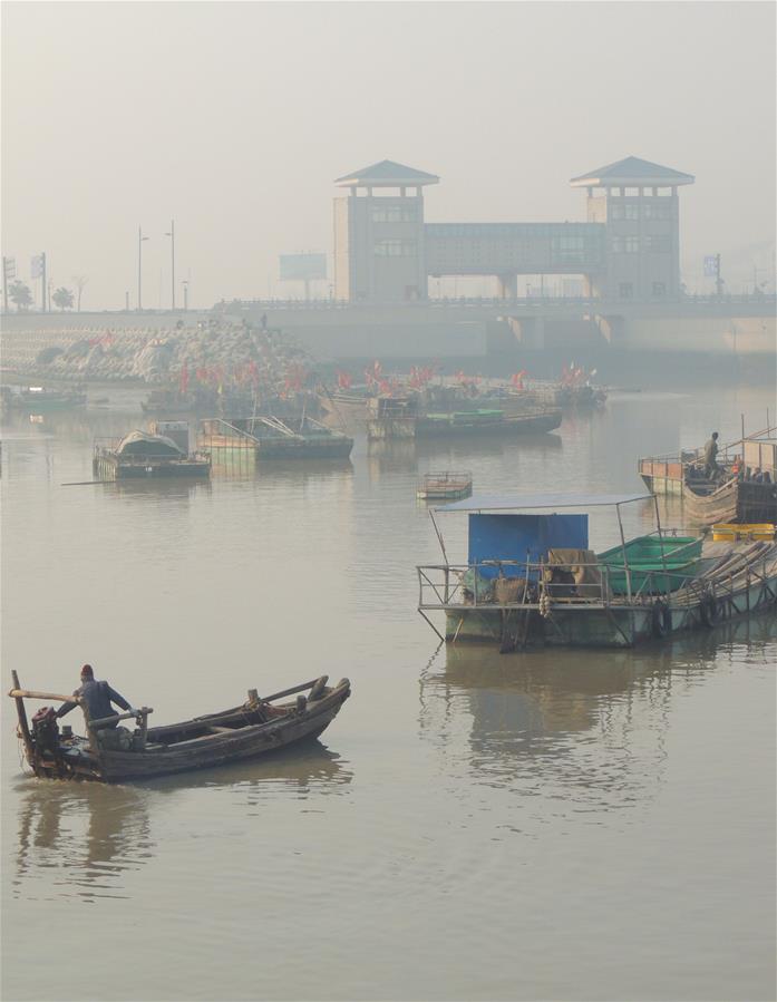 Госметеоцентр Китая вновь объявил о "желтом" уровне опасности в связи со смогом