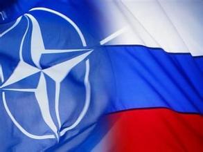 Россия-НАТО: соперничество с рукопожатием?