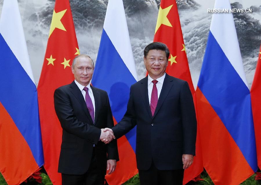 Си Цзиньпин провел переговоры с президентом РФ В.Путиным