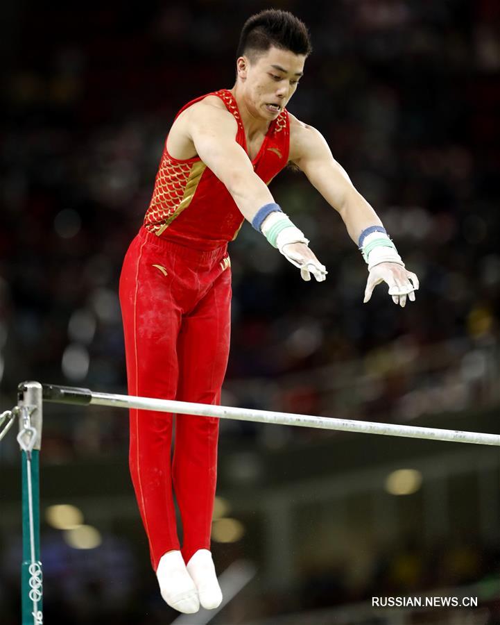 Мужская сборная Китая по спортивной гимнастике завоевала бронзу Олимпийских игр в командном многоборье