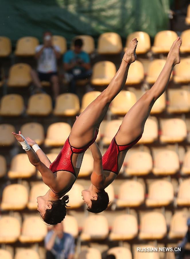 Чэнь Жолинь и Лю Хуэйся завоевали олимпийское золото в синхронных прыжках в воду с вышки 10 метров