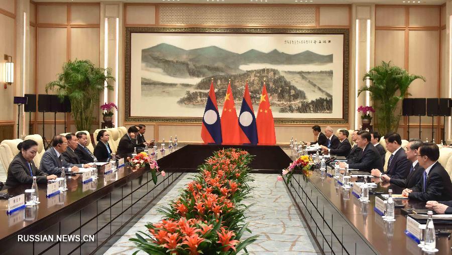 Китай стремится к поступательному развитию отношений всестороннего стратегического сотрудничества и партнерства с Лаосом -- Си Цзиньпин