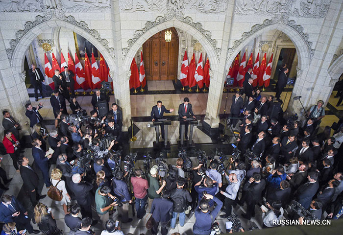 Китай и Канада приступают к переговорам о возможности заключения соглашения о свободной торговле -- Ли Кэцян
