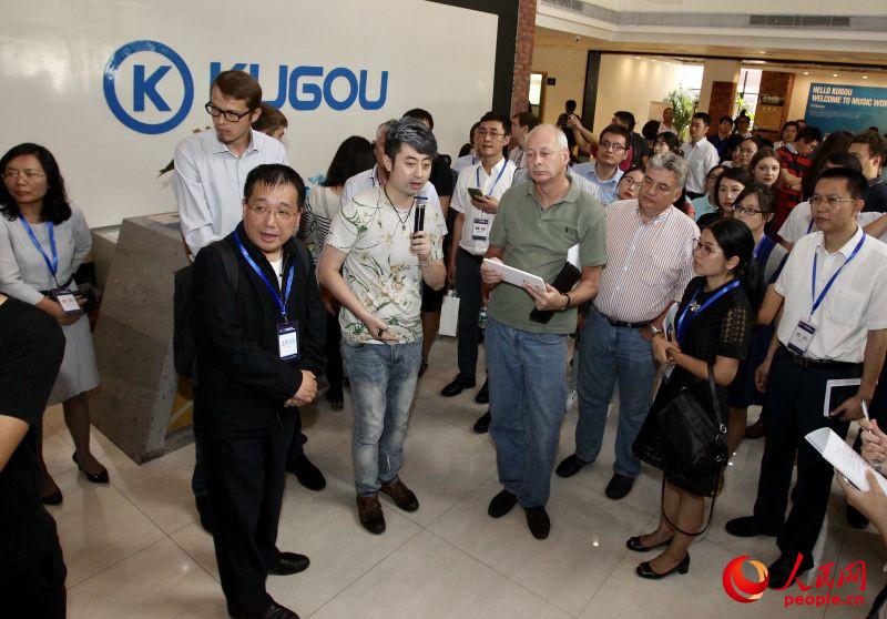 Китайско-российская делегация интернета-СМИ посетила компанию KUGO.