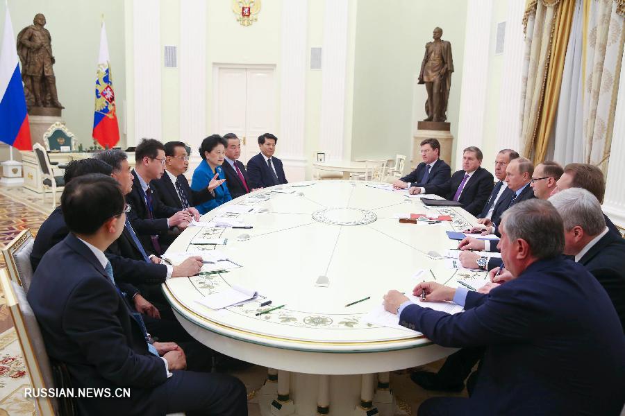 Ли Кэцян встретился с президентом России В.Путиным