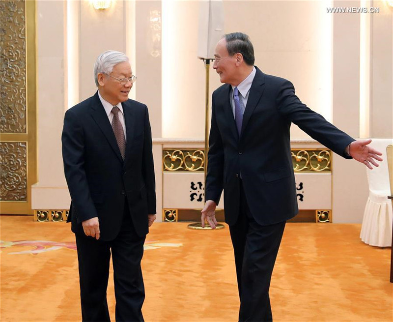 Чжан Дэцзян и Ван Цишань провели встречи с генеральным секретарем ЦК Компартии Вьетнама Нгуен Фу Чонгом