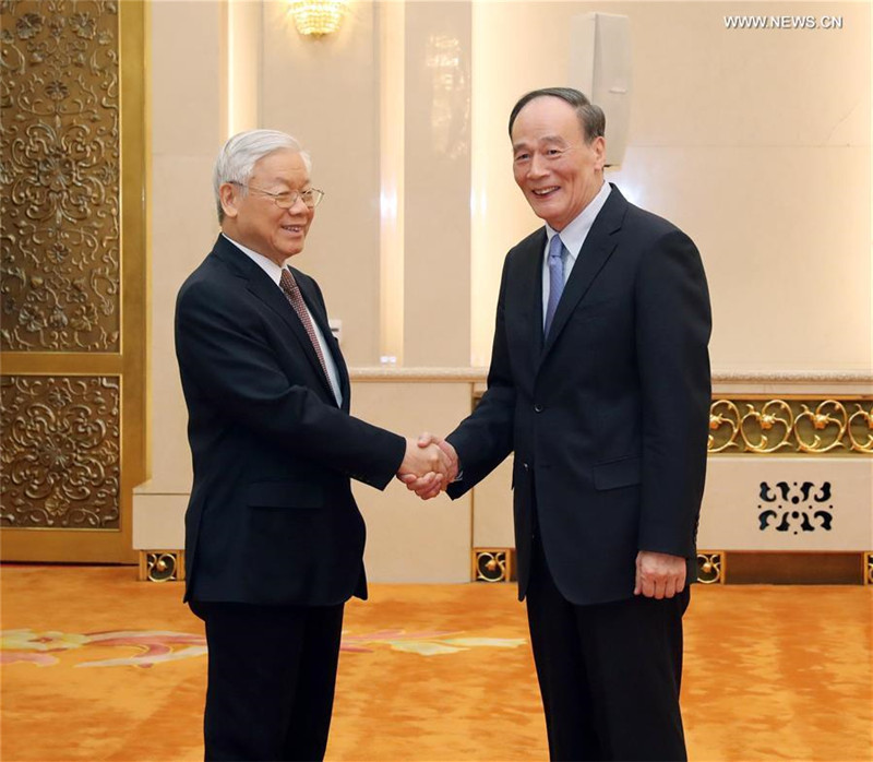 Чжан Дэцзян и Ван Цишань провели встречи с генеральным секретарем ЦК Компартии Вьетнама Нгуен Фу Чонгом