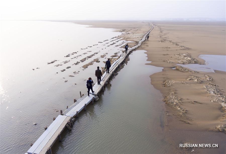 Закончилась реконструкция древнего каменного моста через озеро Поянху