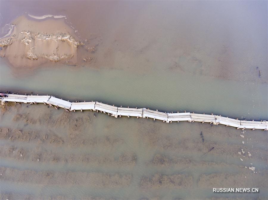 Закончилась реконструкция древнего каменного моста через озеро Поянху