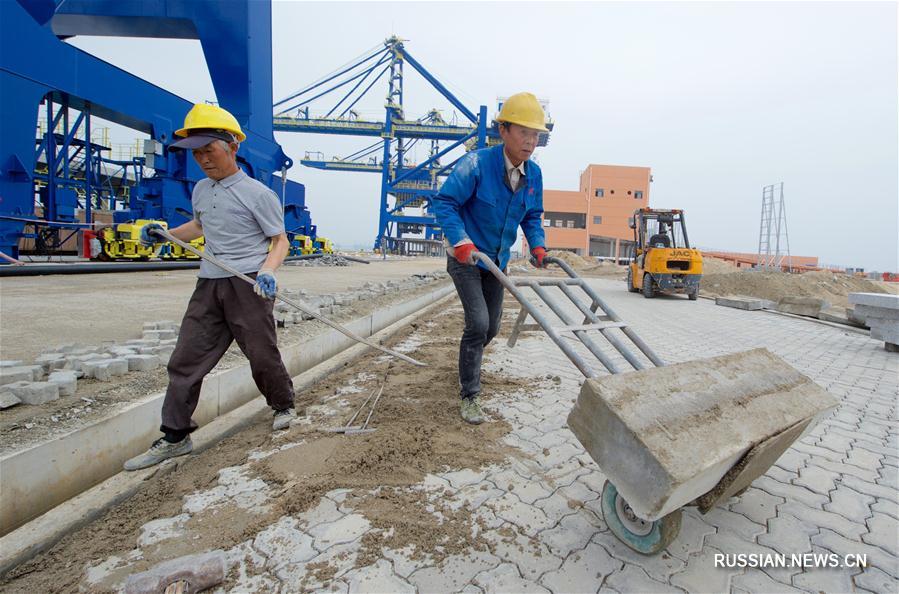 Новые портовые зоны на северном берегу залива Мэйчжоувань