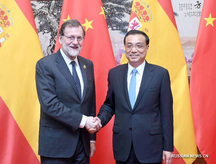 Ли Кэцян встретился с премьер-министром Испании М. Рахоем