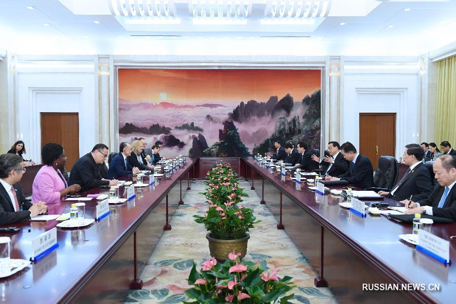 Ли Кэцян встретился с президентом ВБ Джимом Ен Кимом