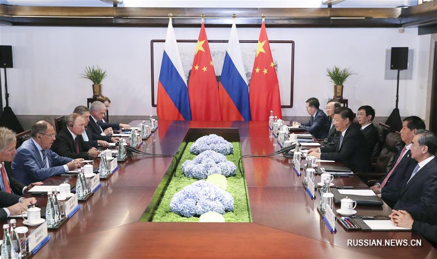 Си Цзиньпин встретился с президентом РФ В.Путиным