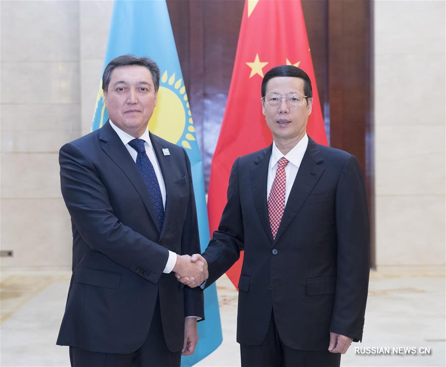 Чжан Гаоли встретился с первым вице-премьером Казахстана А. Маминым