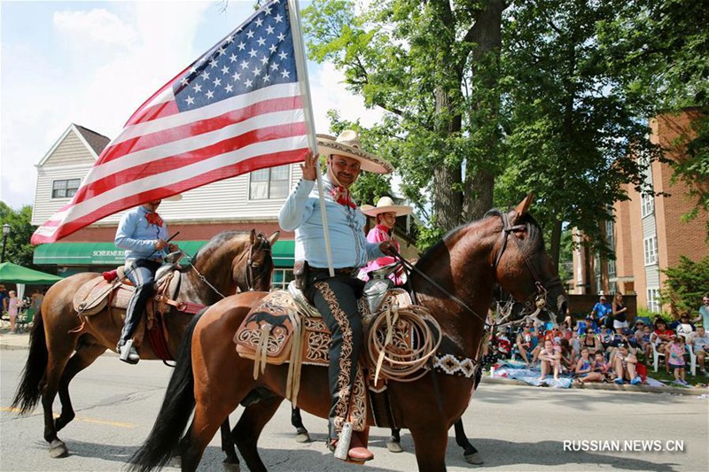 Жители США парадами и шествиями отметили День независимости