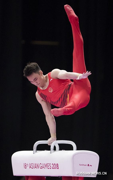 18-е Азиатские игры -- Спортивная гимнастика: Китай выиграл золото в мужских командных соревнованиях