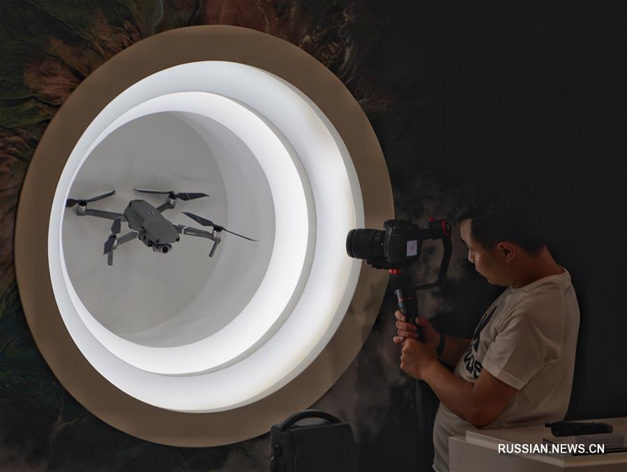 Компания DJI презентовала в Пекине новые модели дронов серии "Юй"