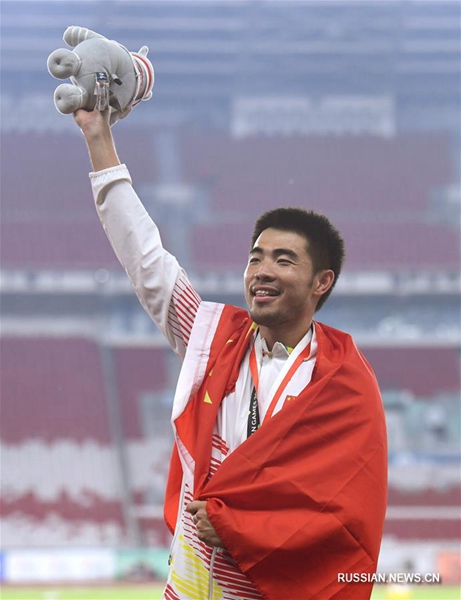 18-е Азиатские игры -- Бег на 110 м с барьерами среди мужчин: китайский спортсмен Се Вэньцзюнь взял "золото"