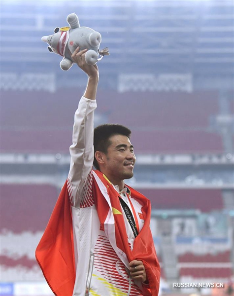 18-е Азиатские игры -- Бег на 110 м с барьерами среди мужчин: китайский спортсмен Се Вэньцзюнь взял "золото"