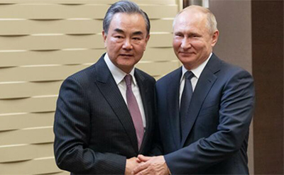 Президент России Владимир Путин встретился с Ван И