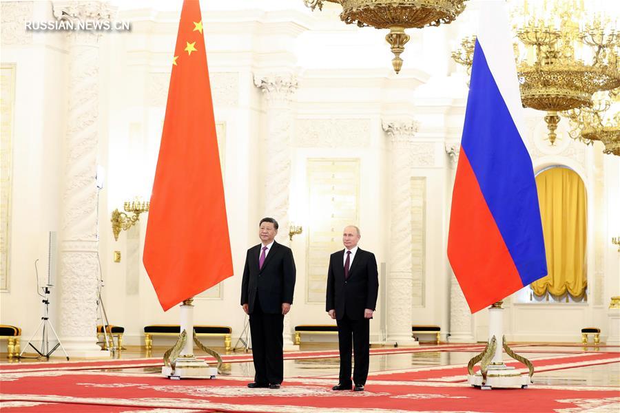 Си Цзиньпин и В. Путин провели переговоры и объявили о развитии китайско-российских всесторонних отношений стратегического взаимодействия и партнерства в новую эпоху