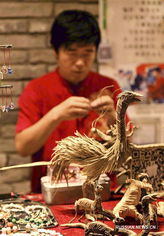 Хань Люе -- продолжатель традиций искусства плетения из соломки