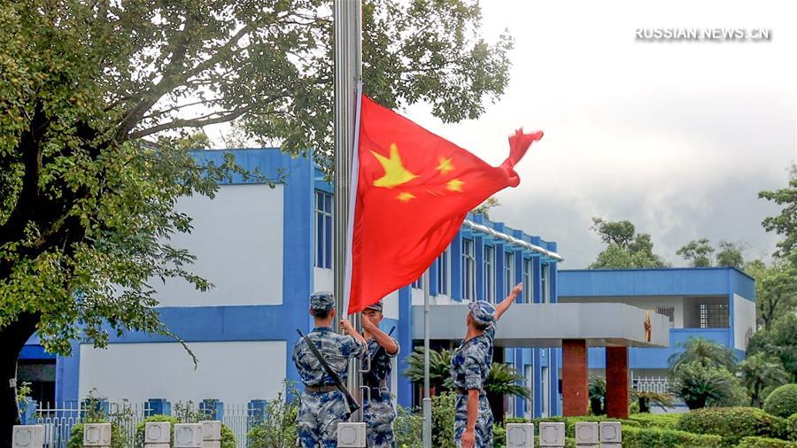 Прибывшие на ротацию в Сянган военнослужащие НОАК провели первую церемонию поднятия государственного флага
