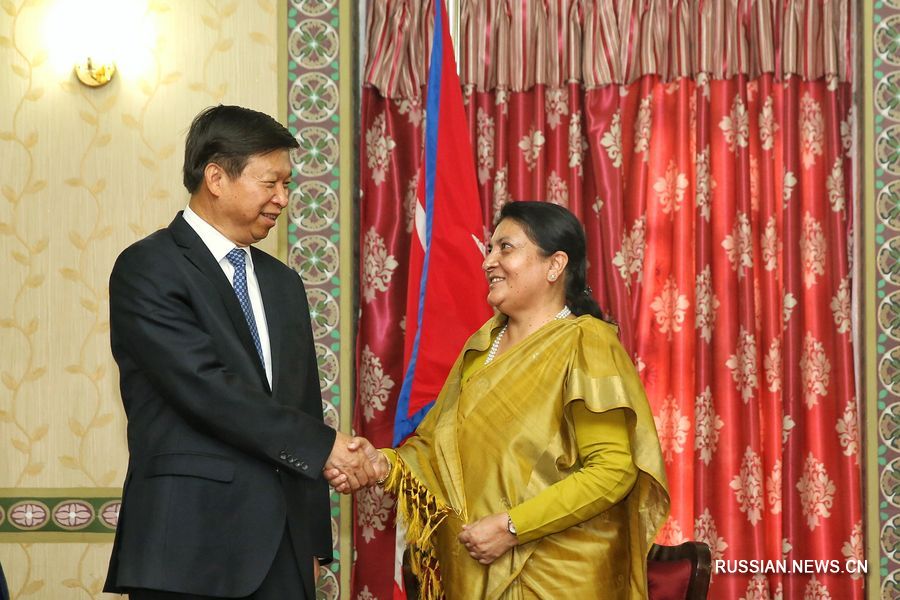 Президент Непала Бидхья Деви Бхандари встретилась с Сун Тао. /Фотографии Синьхуа/