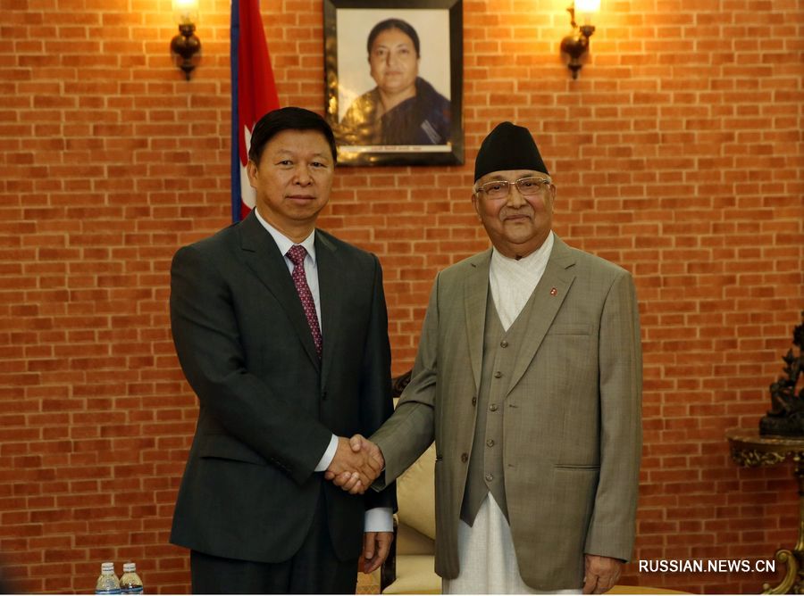 Премьер-министр Непала Кхадга Прасад Шарма Оли встретился с Сун Тао. /Фотографии Синьхуа/