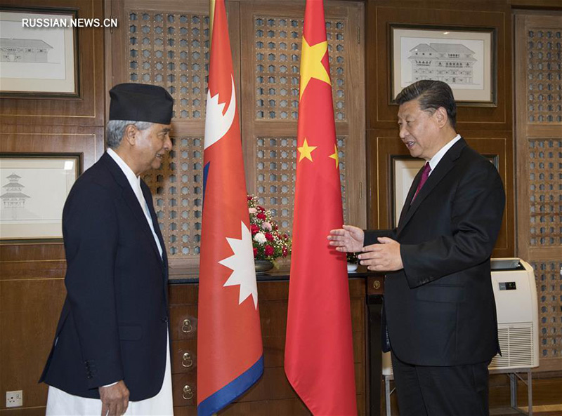 Си Цзиньпин встретился с председателем партии Непальский конгресс Шером Бахадуром Деубой