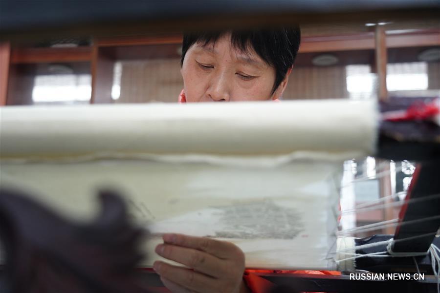 Традиционная вышивка волосами из провинции Цзянси