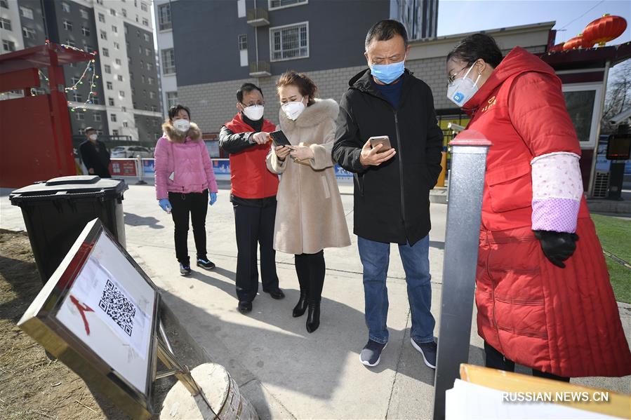 "Интеллектуальная" борьба с эпидемией в общинах Иньчуаня: сканирование QR-кода на входе и выходе