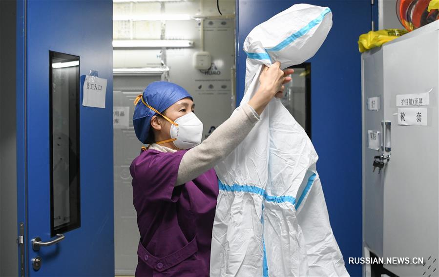 Невидимый отряд борцов с вирусом в больнице "Лэйшэньшань"