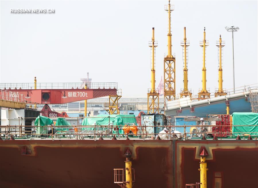 Шанхай: судостроительный завод "Цзяннань" ускоряет возобновление работы и производства