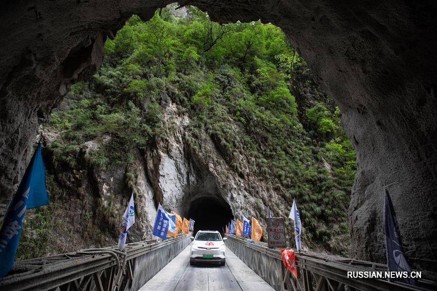 Открылось движение по дороге в последней в Китае деревне, обладающей условиями для прокладки дорог с твердым покрытием