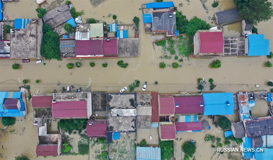 Старинный городок в провинции Аньхой столкнулся с сильнейшим наводнением