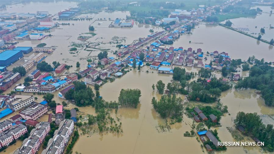 Старинный городок в провинции Аньхой столкнулся с сильнейшим наводнением