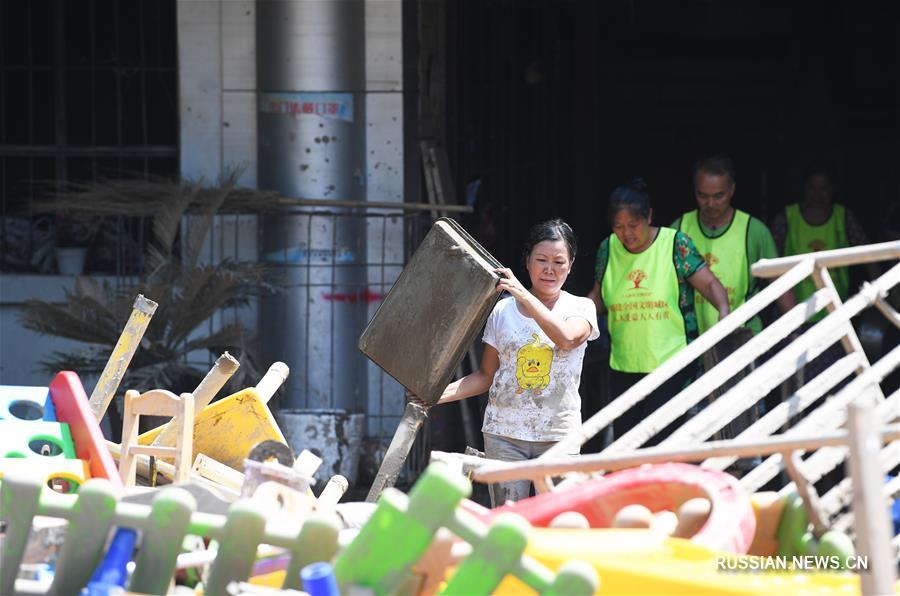 Восстановительные работы после наводнения в Чунцине