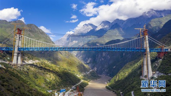 Смыкание крупного моста железной дороги Лицзян – Шангри-Ла