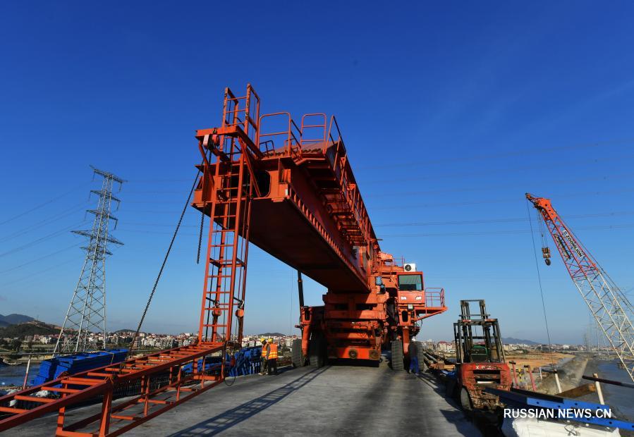 Строительство большого железнодорожного моста через залив Мэйчжоу
