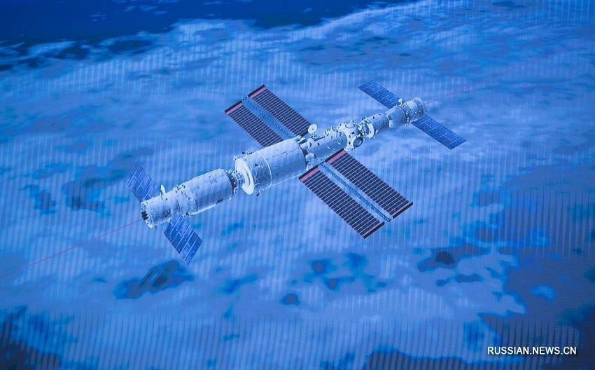 Китайский пилотируемый космический корабль "Шэньчжоу-12" состыковался с основным модулем космической станции