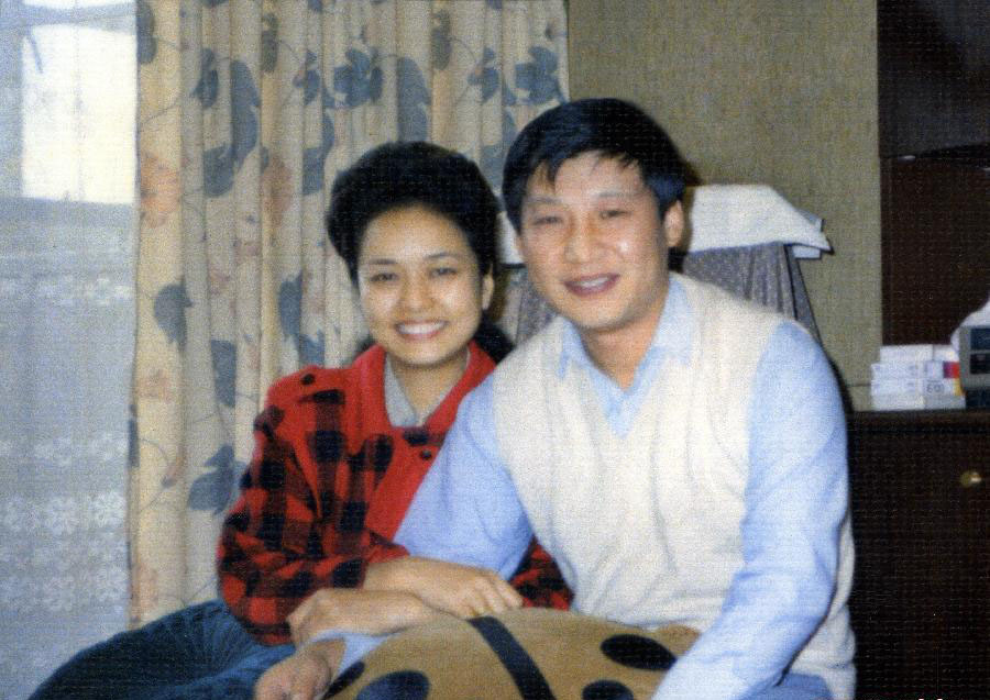 Си Цзиньпин с супругой Пэн Лиюань.